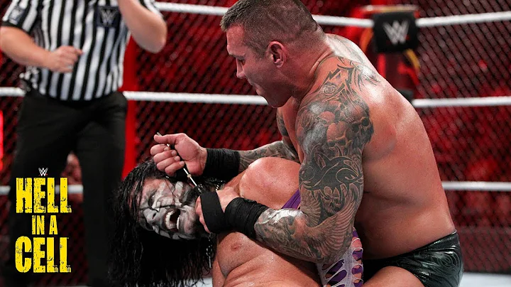 Randy Orton ruthlessly twists Jeff Hardy's earlobe...