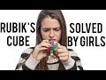 Rubik&#39;s cube being solved by girls