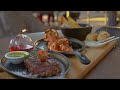 ANFITRIONES BISQUERTT: Barroco, carnes y mariscos con escenografía mediterránea