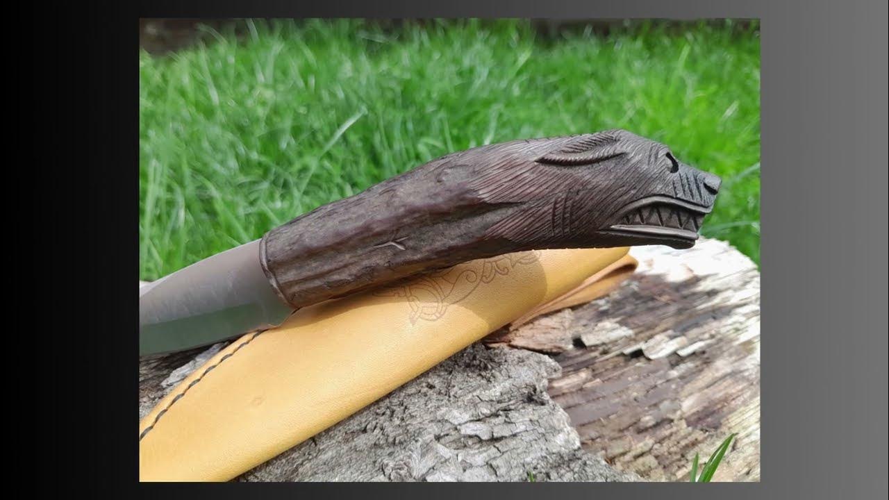 Viking style knives with a handcarved handles and leather sheath