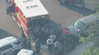 Florida fatal shooting: Suspect in custody after deaths of news employee, 9-year-old girl