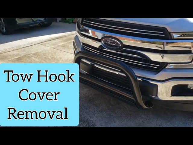 Tow hook cover removal 