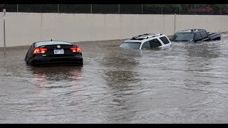 Thursday's torrential rain leaves the Kansas City area flooded, and cars floating in Westport