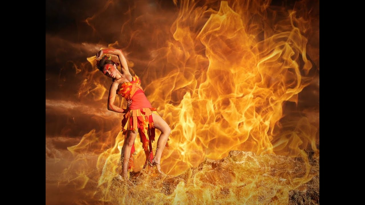 Пляши в огне. Огненный танец. Огненная девушка. Танцовщица с огнем. Танец пламени.