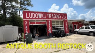 Restocking the Antique booth in Ludowici, Georgia with Antiques and Vintage collectibles