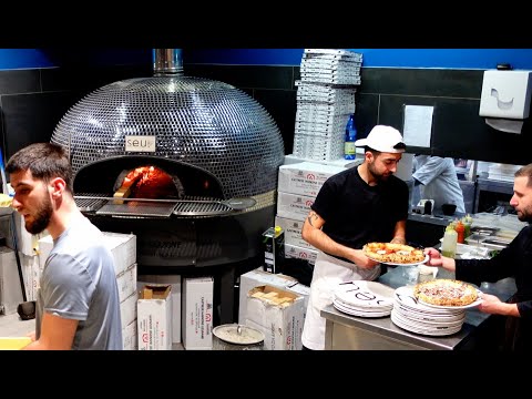 Video: Mga Pizzeria ng Roma - La gatta mangiona vs La Fucina