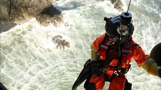 Coast Guard: Cape Disappointment: Surfer on the Rocks