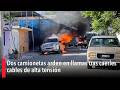 Dos camionetas arden en llamas tras caerles cables de alta tensión