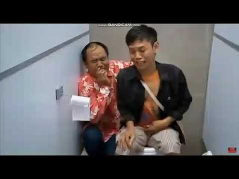 Asian man with diarrhea while another is next to Him