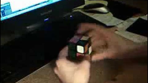 Using Layer and CLL algorithms to Solve a 2 by 2 Rubik