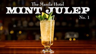 This Mint Julep from the 1920s is garnished with mint, pineapple, cherries and RUM! @makeanddrink