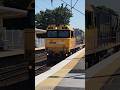 PN011 leading a mostly empty freight train through Wooloowin. #trains #queenslandrail #shorts
