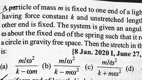 A particle of mass m is fixed at one end of a light spring #jee #jeemain #physics #jeephysics #pyq