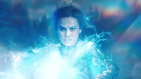 How did Captain Marvel get her powers in the comics?