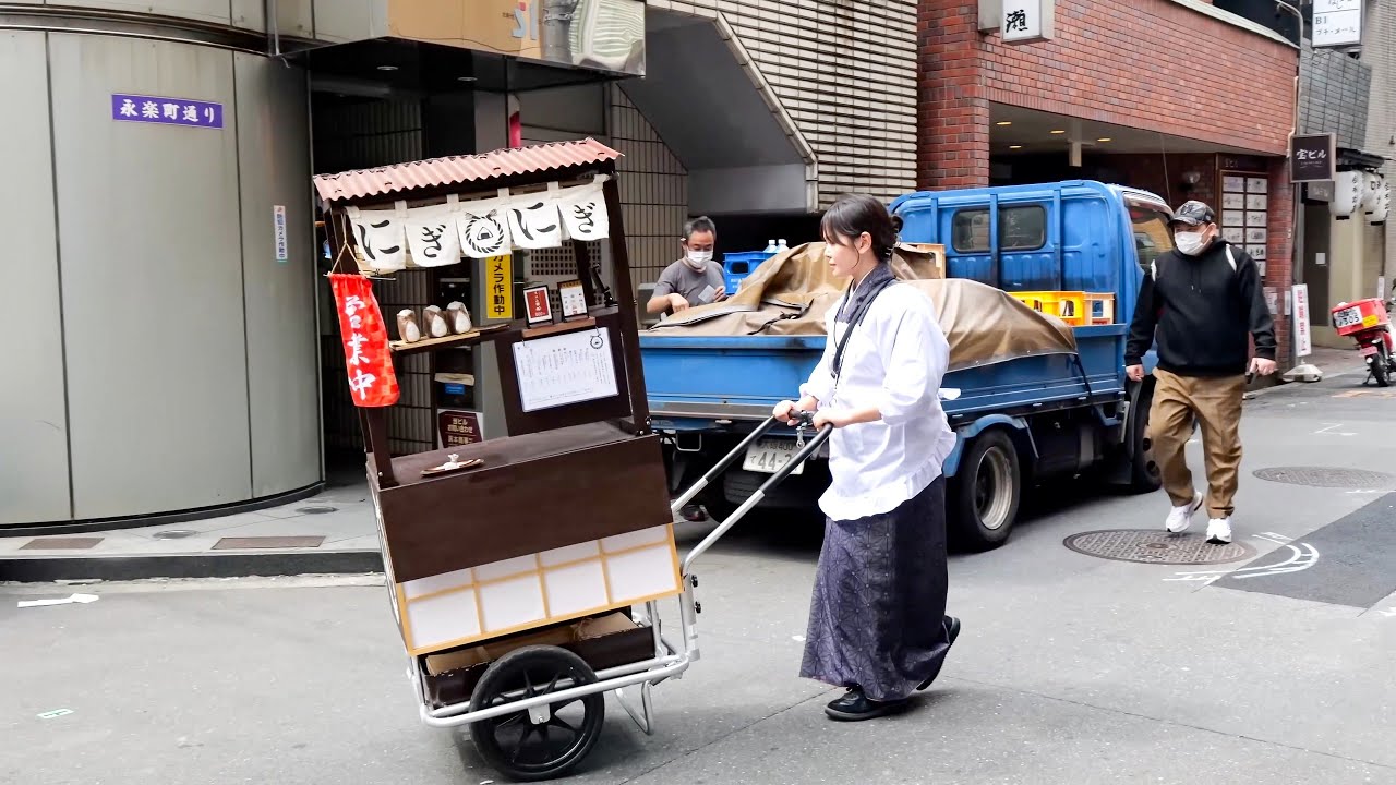 Meet the 29-Year-Old Entrepreneur Driving a 60kg Rice Ball Cart