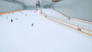 Giant indoor ski resort offers summer relief in China's furnace city