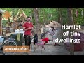 French carpenters craft offgrid hamlet of tiny dwellings