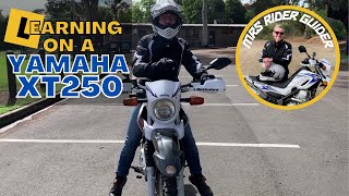 PERFECT LEARNER BIKE MRS RIDER GUIDER ON HER YAMAHA XT250 IN CAR PARK
