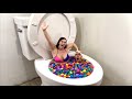 Going underwater in worlds largest toilet surprise eggs pool with friends