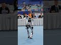 This humanoid is dancing in front of judges at the 2026 World Humanoid Robot Games in Beijing