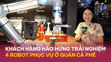 Khách hàng hào hứng trải nghiệm 4 robot phục vụ ở quán cà phê | VnExpress