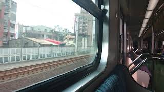 4030次EMU600區間快車通過汐止超越1184次區間車
