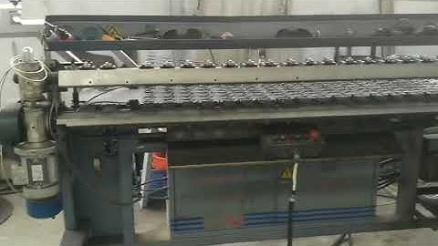 Mattress bonell spring coiling assembly machine