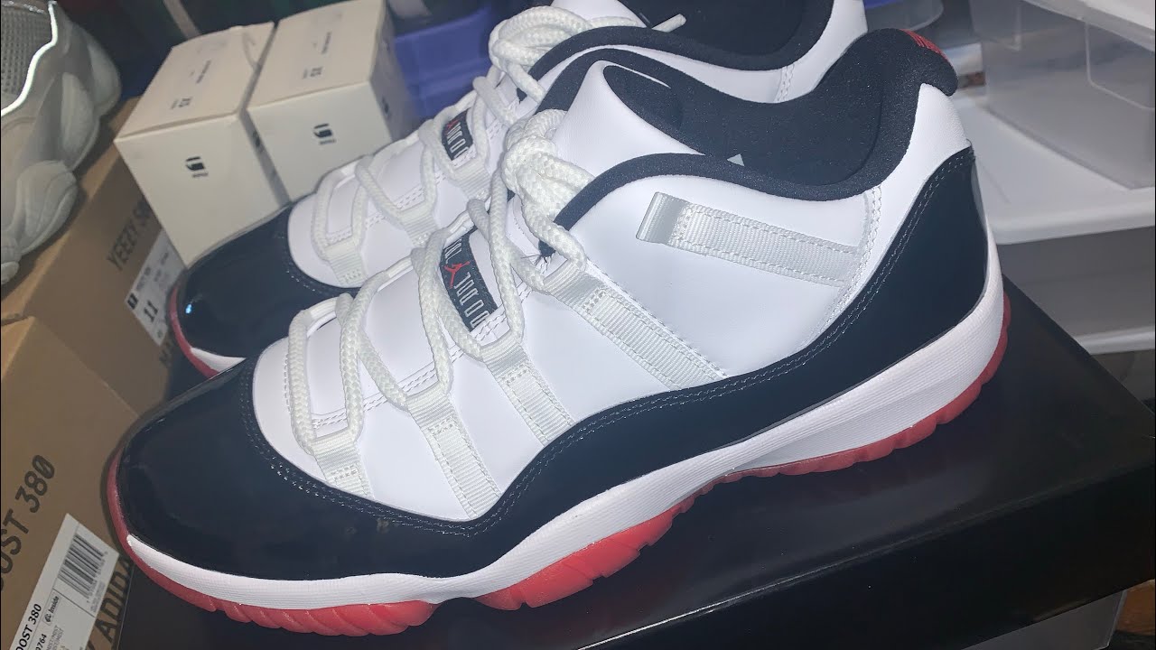 jordan 11 white bred low