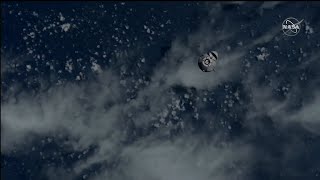 SpaceX CRS-26 Cargo Dragon nears space station in view from space