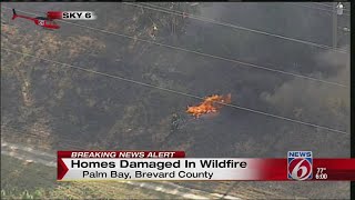 Palm Bay brush fire damages 4 homes