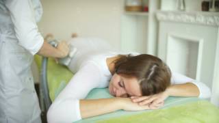 Girl in specific tights is massaged with LPG massage system screenshot 1