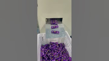 Stick wrapping machine for candy