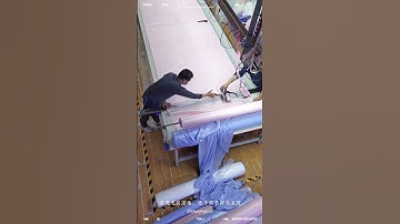 The cloth spreading process in the cutting table dept.#clothingbrands #clothfactory #kidswearfactory