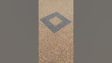 Create any design on the Resin Bound Paving using tiling trims. #resinbound #resin #satisfying