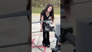 Female Drone Pilot: Heavy Cargo Lifting with DJI Drone