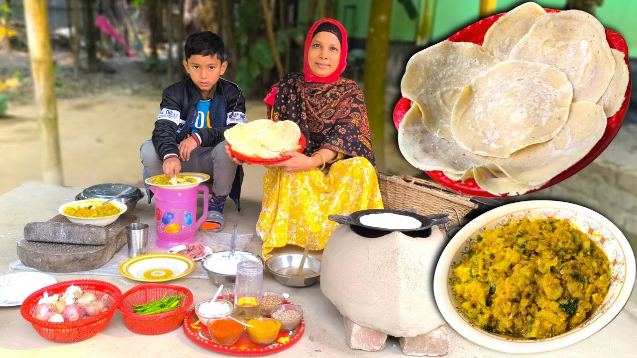 শিলপাটায় গৃহস্থালি খুদ বাইটা বিলুপ্ত হয়ে যাওয়ার মতো একটি চাপরি পিঠা বানালাম সাথে ডাল সবজির ভাজি।
