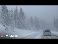Non-stop snow pounds California&#39;s Sierra Nevada, closing down freeways