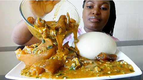 NIGERIAN FOOD MUKBANG OGBONO OKRO SOUP WITH KPOMO, COW FOOT AND POUNDO FUFU.