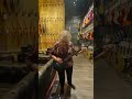 Grandma shreds inside a Guitar Center with Lit