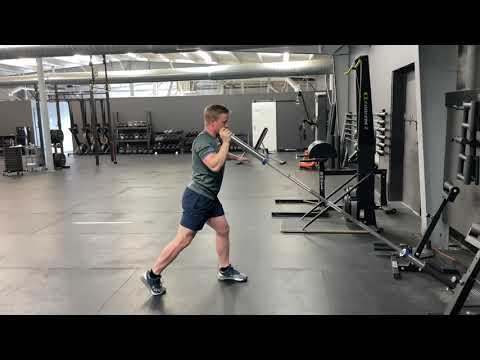 Staggered Stance Single-Arm Landmine Push Press