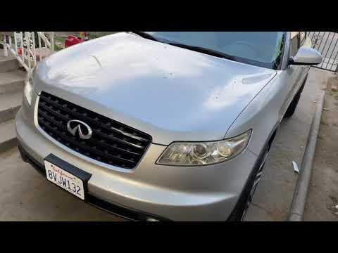 1st gen Infiniti FX35 on 22” Blaque Diamond wheels