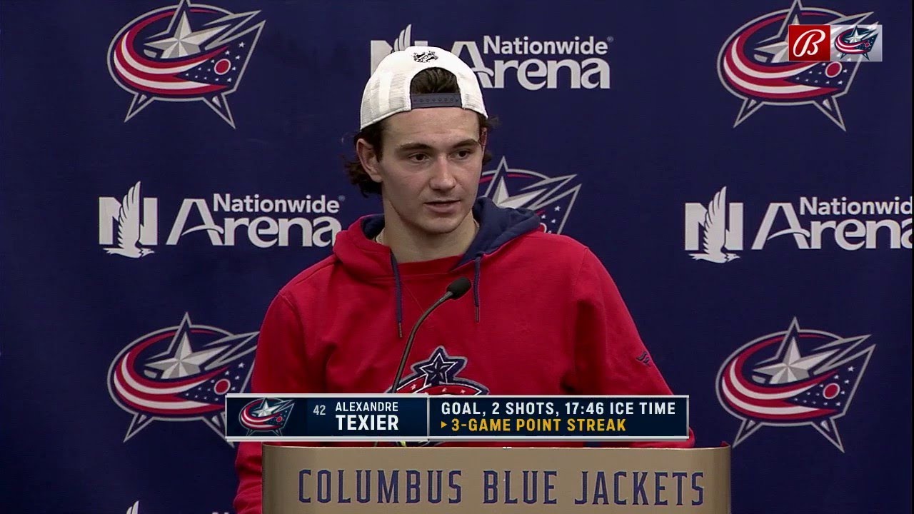 Alexandre Texier Columbus Blue Jackets Unsigned Navy Jersey Skating with Puck vs. Tampa Bay Lightning Photograph