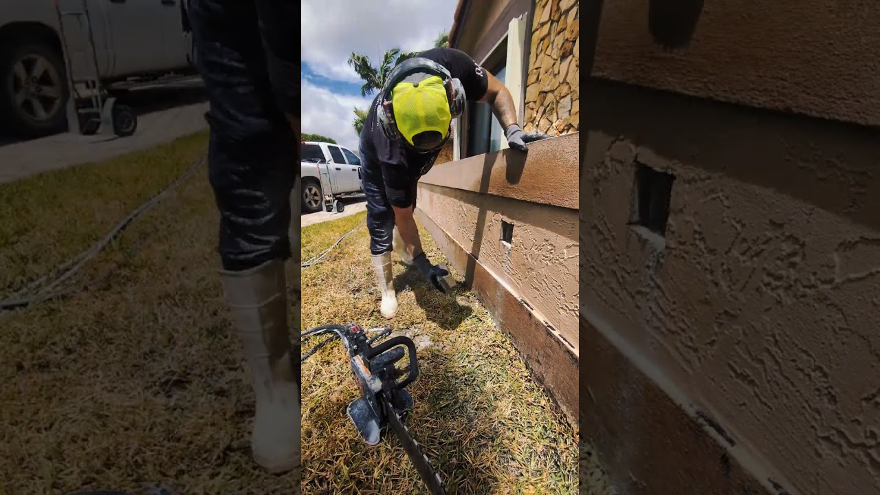 Cutting 4 inch by 4 inch scupper holes in a planter in Miami using the Chainsaw