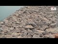 Reinforced Soil Wall withTechFab  Metal Gabion facing for Water Front Structures