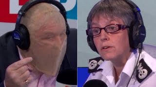 ... nick ferrari interviewed the met police commissioner while wearing
a spit h...