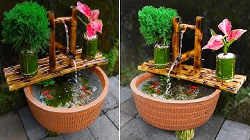 Lạ mắt với bể cá thác nước từ rổ nhựa và tre