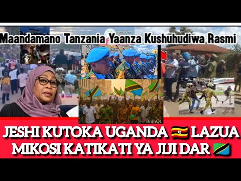 B L UGANDAN ARMY ORGANIZES PROTESTS AFTER ARRIVAL IN TZ