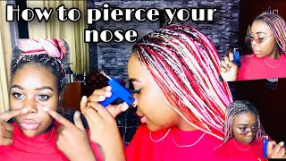 HOW TO PIERCE YOUR OWN NOSE AT HOME WITH A GUN // super easy. 2020 tips