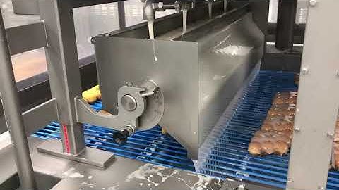 Donut glazing with Bakon waterfall enrober.