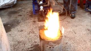 Melting soda cans and aluminium in furnace made from dirt Waste oil fueled